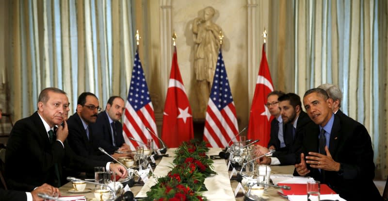 U.S. President Barack Obama meets with Turkish President Recep Tayyip Erdogan (L) at the U.S. ambassador's residence during the World Climate Change Conference 2015 (COP21) in Paris, France in this December 1, 2015 file photo. REUTERS/Kevin Lamarque  