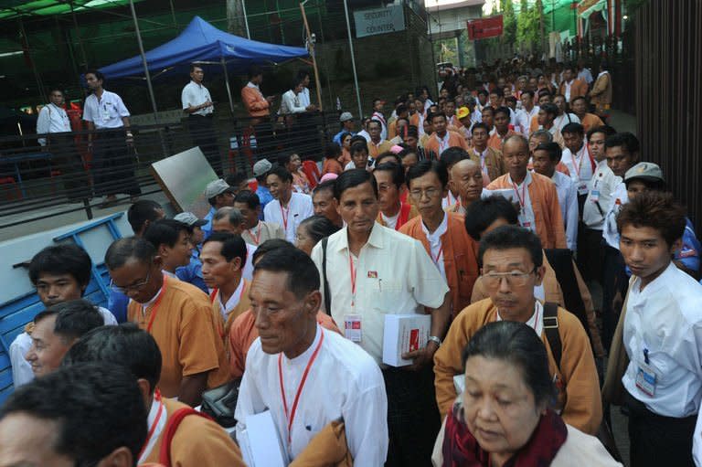 National League for Democracy (NLD) delegates leave after their conference at the Royal Rose Hall in Yangon on March 8, 2013. Myanmar's Aung San Suu Kyi was set to address her party during its historic congress Saturday as the once-banned opposition seeks to revamp its leadership and eyes its first chance at power in 2015 polls