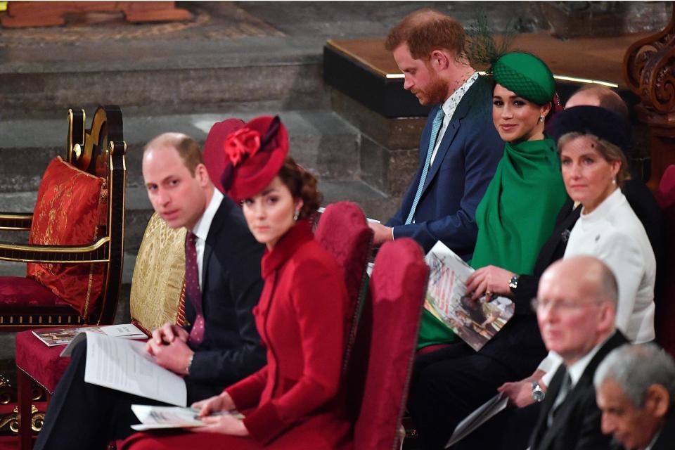 The Cambridges and Sussexes in their seats at&nbsp;Commonwealth Day services. (Photo: PHIL HARRIS via Getty Images)