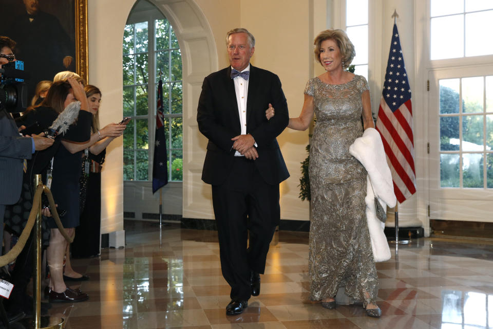 Rep. Mark Meadows, R-N.C., left, and wife Debbie Meadows arrive for a State Dinner with Australian Prime Minister Scott Morrison and President Donald Trump at the White House, Friday, Sept. 20, 2019, in Washington. (AP Photo/Patrick Semansky)