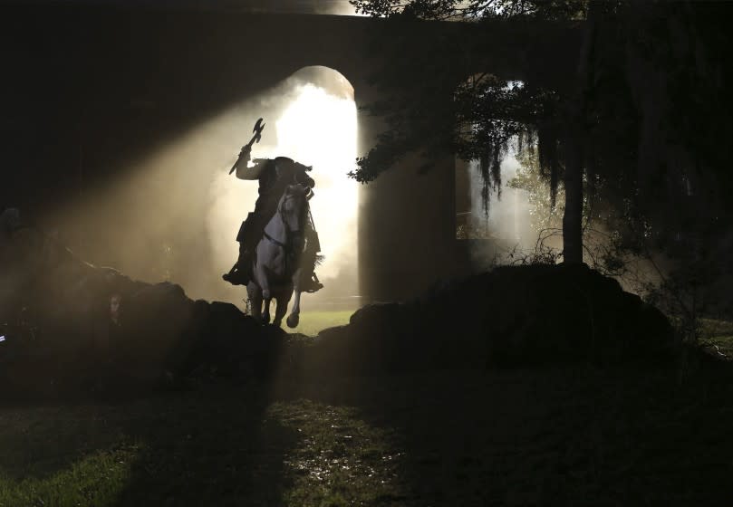 The Headless Horseman searches for Ichabod and Abbie.