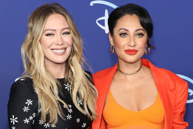 <p>Dia Dipasupil/Getty</p> Hilary Duff and Francia Raisa attend the 2022 ABC Disney Upfront at Basketball City