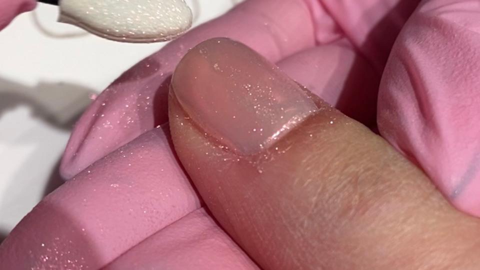 Chrome powder applied to nail 