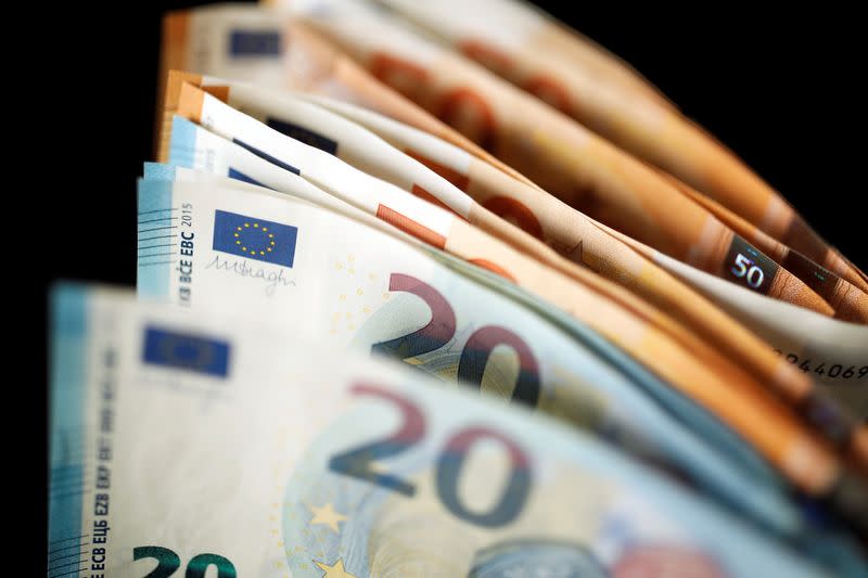 50 and 20 Euro banknotes are displayed in this picture illustration