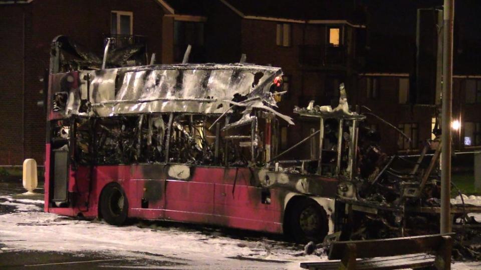 The burnt out double decker bus in Church Road near Rathcoole in Newtownabbey on Sunday night (David Young/PA (PA Wire)