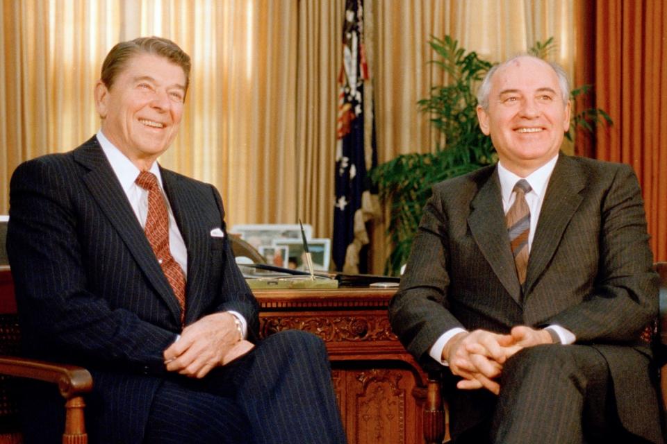 Soviet leader Mikhail Gorbachev meets with President Ronald Reagan in the Oval Office on Dec. 9, 1987. The two formed an unlikely partnership to reduce the number of nuclear weapons   around the globe.
