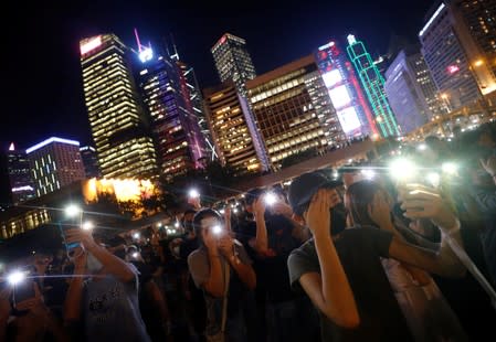 Students stage a rally to call for political reforms outside City Hall in Hong Kong