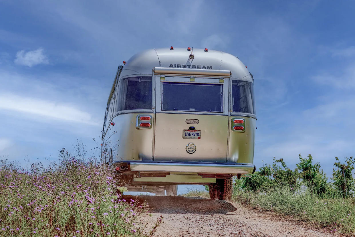 This is a 2024 Trade Wind Airstream. It is 26 feet, 2 inches long; 8 feet, 5-and-a-half inches wide; and weighs 6,200 pounds