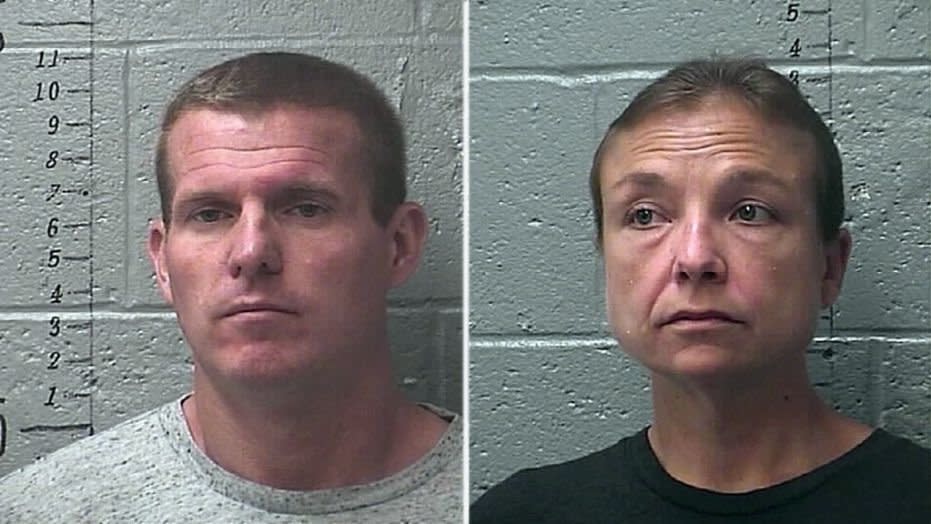 Daryl J. Head (left) and Laura Cheatham face charges after four children were found in what the sheriff described as "deplorable" conditions.