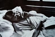 Mohandas Karamchand Gandhi resting during a rail journey to Delhi. 1946. Gandhi (2 October 1869 Ð 30 January 1948). was the preeminent leader of the Indian independence movement in British-ruled India. (Photo by: Universal History Archive/Universal Images Group via Getty Images)