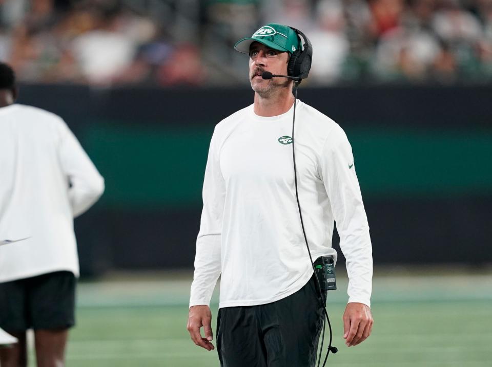 New York Jets quarterback Aaron Rodgers on the sideline during a preseason NFL game against the Tampa Bay Buccaneers at MetLife Stadium on Saturday, Aug. 19, 2023, in East Rutherford.