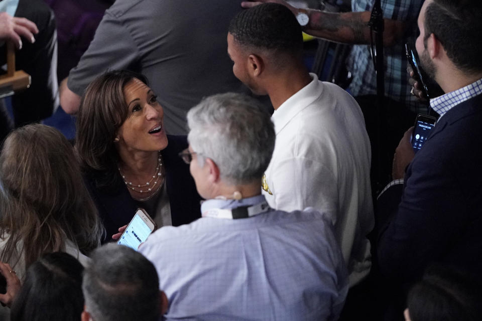 Democratic presidential candidate Sen. Kamala Harris, D-Calif., talks with people in the spin room Thursday, Sept. 12, 2019, after a Democratic presidential primary debate hosted by ABC at Texas Southern University in Houston. (AP Photo/David J. Phillip)