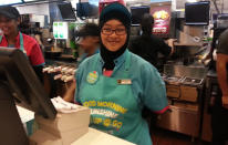 One of the cheerful staff to greet morning customers. (Yahoo! Photo)