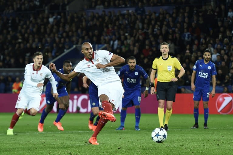 Sevilla's midfielder Steven N'Zonzi (C) takes a penalty that is saved during the UEFA Champions League round of 16 second leg football match between Leicester City and Sevilla at the King Power Stadium on March 14, 2017