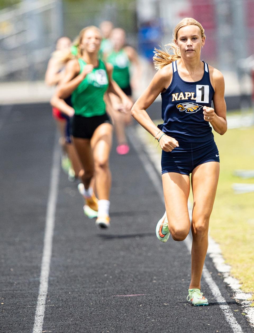 Tara Watkins of Naples High wins the 800 at the FHSAA Class 3A District-12 track and field meet at South Fort Myers High School on Saturday, April 23, 2022. 
