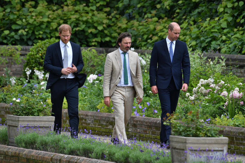 The Duke of Sussex (left), the Duke of Cambridge (right) and garden designer Pip Morrison, arrive for the unveiling of a statue they commissioned of the Dukes' mother Diana, Princess of Wales, in the Sunken Garden at Kensington Palace, London, on what would have been her 60th birthday. Picture date: Thursday July 1, 2021.