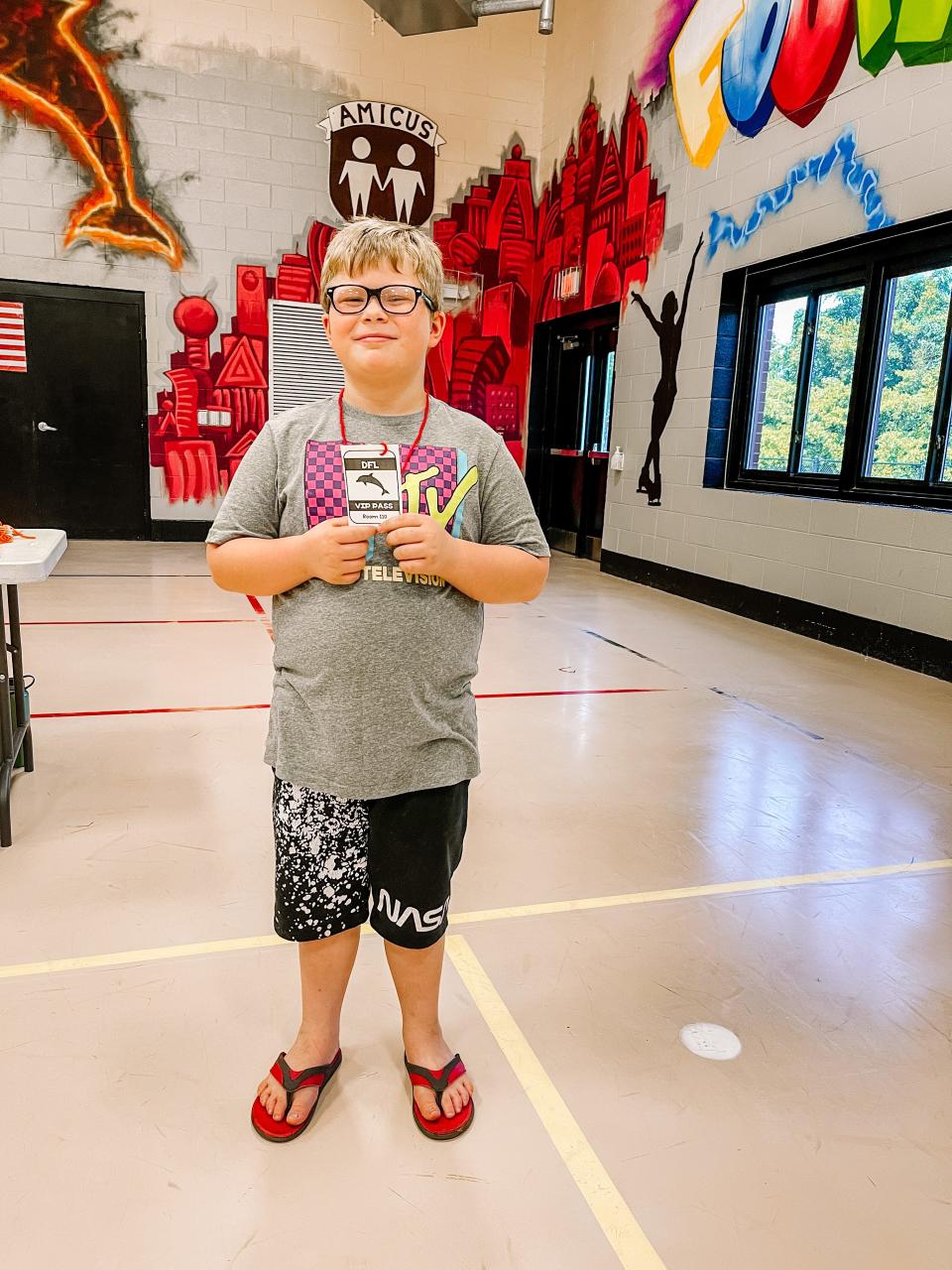 Maxton Ward receives his “VIP backstage pass” at Dogwood Elementary School’s Back to School Premiere event on Aug. 3, 2022.