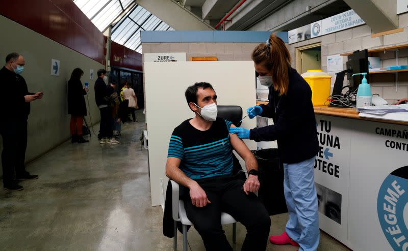 Primary school worker receives an AstraZeneca vaccine in San Sebastian