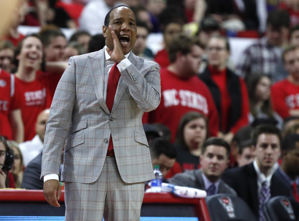 North Carolina State head coach Kevin Keatts yells to his team during the first half an NCAA college basketball game against Notre Dame in Raleigh, N.C., Wednesday, Jan. 8, 2020. (Ethan Hyman/The News & Observer via AP)
