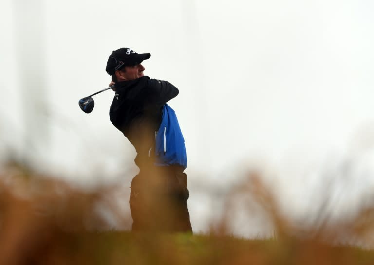 Scotland's Marc Warren watches his shot from the 16th tee during his second round on day two of the 2016 British Open Golf Championship at Royal Troon in Scotland on July 15, 2016