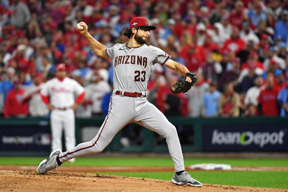 Oct 16, 2023; Philadelphia, Pennsylvania, USA; Arizona Diamondbacks starting pitcher Zac Gallen (23) pitches during the first inning against the Philadelphia Phillies in game one of the NLCS for the 2023 MLB playoffs at Citizens Bank Park. Mandatory Credit: Eric Hartline-USA TODAY Sports