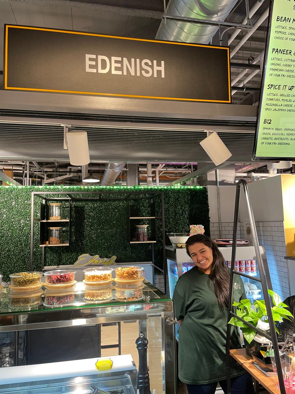 Shrewsbury high school junior Kashvi Vishal in front of her new business, Edenish Salads.