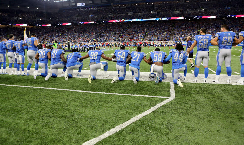 Members of the Detroit Lions take a knee during the playing of the national anthem prior to the start of the game against the Atlanta Falcons at Ford Field on September 24, 2017 in Detroit, Michigan. (Photo by Rey Del Rio/Getty Images)