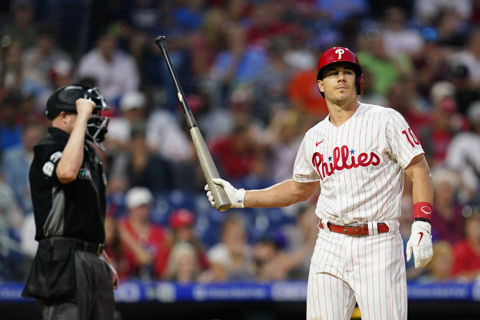 Philadelphia Phillies' J.T. Realmuto reacts after striking out against Colorado Rockies pitcher Kyle Freeland during the fourth inning of a baseball game, Saturday, Sept. 11, 2021, in Philadelphia. (AP Photo/Matt Slocum)