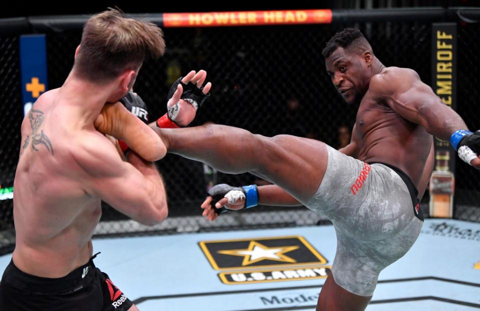 Francis Ngannou kicks Stipe Miocic at UFC 260 (Getty)