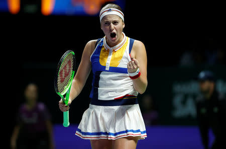 Tennis - WTA Tour Finals - Singapore Indoor Stadium, Singapore - October 22, 2017 Latvia's Jelena Ostapenko reacts during her group stage match with Spain's Garbine Muguruza REUTERS/Edgar Su