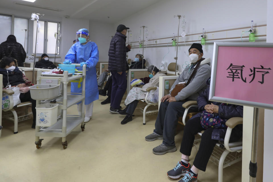 In this photo released by Xinhua News Agency, Patients wearing face masks receive oxygen therapy at a community healthcare institution in Shanghai, China, Monday, Jan. 5, 2023. As COVID-19 rips through China, other countries and the WHO are calling on its government to share more comprehensive data on the outbreak, with some even saying many of the numbers it is reporting are meaningless. (Fang Zhe/Xinhua via AP)