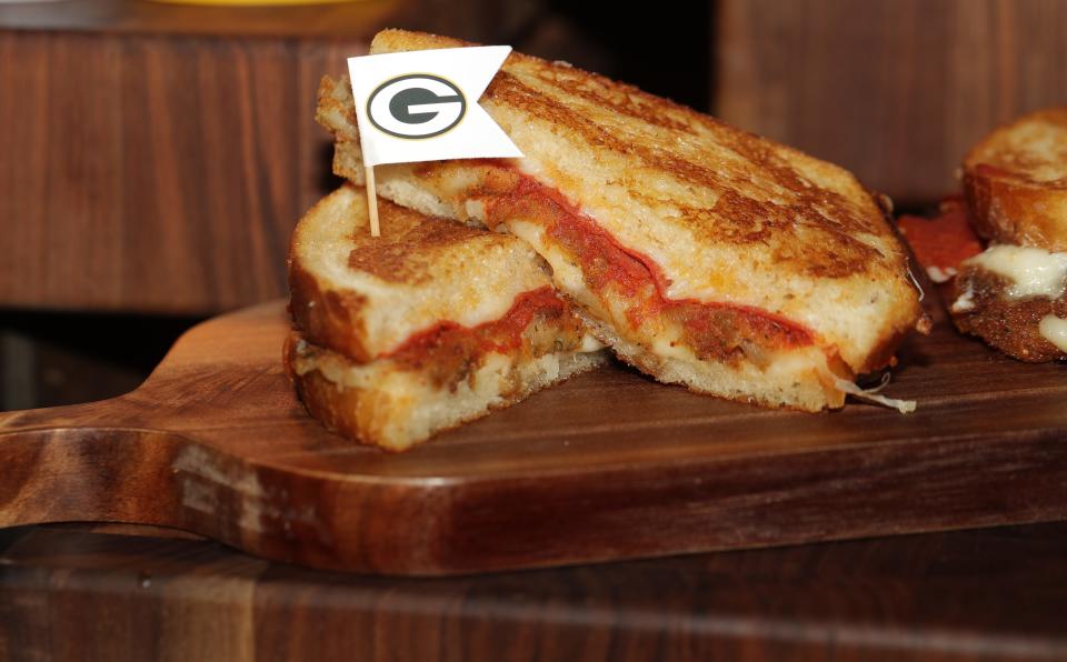 A Mozzarella Stick Grilled Cheese, a battered mozzarella stick combined with marinara, pepperoni and shredded mozzarella on sourdough bread, is one of the new Lambeau Field concession items available for the 2023 season.