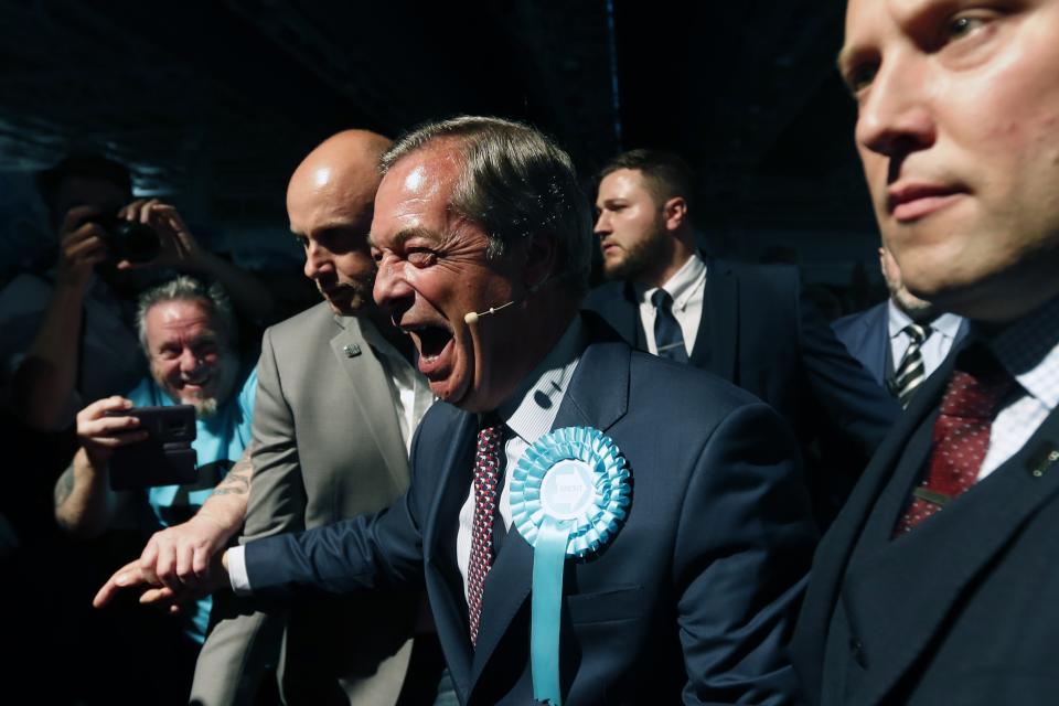 FILE - In this Tuesday, May 21, 2019 file photo, Brexit Party leader Nigel Farage, center, shakes hands with his supporters during a Brexit Party rally in London. The European Parliament elections have never been so hotly anticipated or contested, with many predicting that this year’s ballot will mark a coming-of-age moment for the euroskeptic far-right movement. The elections start Thursday May 23, 2019 and run through Sunday May 26 and are taking place in all of the European Union’s 28 nations. (AP Photo/Frank Augstein, File)