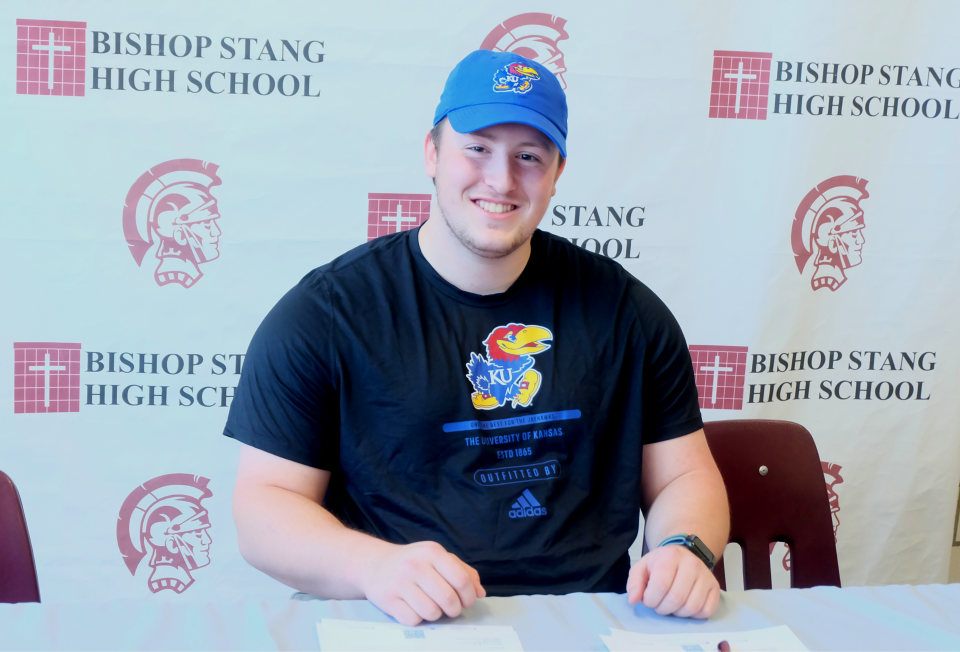 Bishop Stang's Jacob Cookinham will attend the University of Kansas next year and throw the shot put.