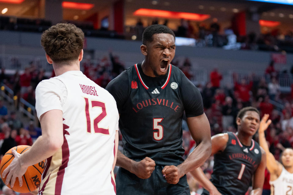 Louisville Cardinals forward Brandon Huntley-Hatfield (5) celebrates his dunk during their game against the Florida State Seminoles on Saturday, Feb. 3, 2024 at KFC YUM Center.