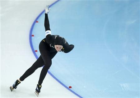 Heather Richardson of the U.S. skates during the women's 1,000 metres speed skating race at the Adler Arena during the 2014 Sochi Winter Olympics February 13, 2014. REUTERS/Phil Noble