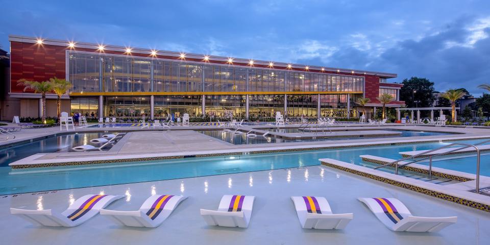 Louisiana State University’s Student Recreation Complex includes an outdoor aquatic and adventure center and a leisure pool spelling out the letters LSU.