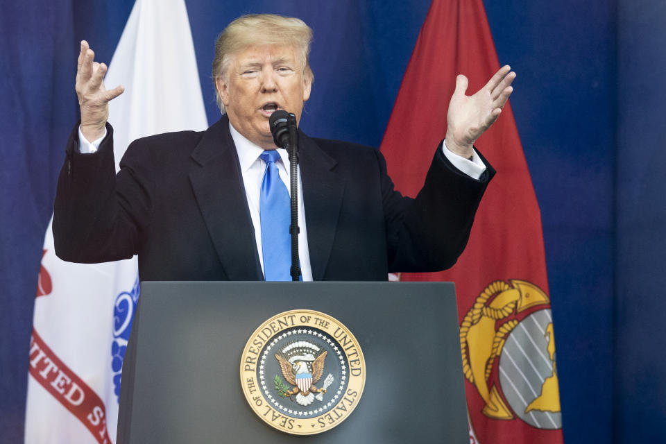 MANHATTAN, NY - NOVEMBER 11: President Donald J. Trump holding up his hands during his address of the crowd for the opening ceremony of the100th annual Veterans Day Parade.  The Presidential Address was held in Madison Square Park in the Manhattan borough of New York on November  11, 2019, USA.  (Photo by Ira L. Black/Corbis via Getty Images)