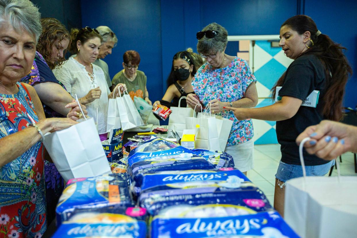 Volunteers for Emergency Medical Assistance gather to pack bags with items to assist women needing to travel out of state to seek an abortion Saturday July 27, 2024 in Lake Worth Beach.