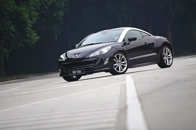 Peugeot RCZ THP200<br> Sporting a distinctive double bubble roof, the Peugeot RCZ is a good-looking French coupe that has been well received here in Malaysia. The 200bhp 1.6-litre turbocharged engine is able to propel this coupe from 0-100km/h in 7.5 seconds. Unlike the first two, the RCZ has the sports car looks to match the sports car performance, which is why its so popular over here.