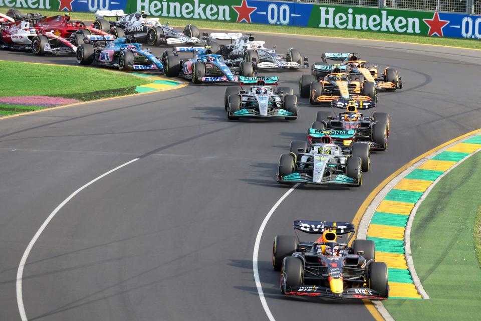 Formula One driver Max Verstappen steers his car into turn two at the start of the 2022 Australian Grand Prix.