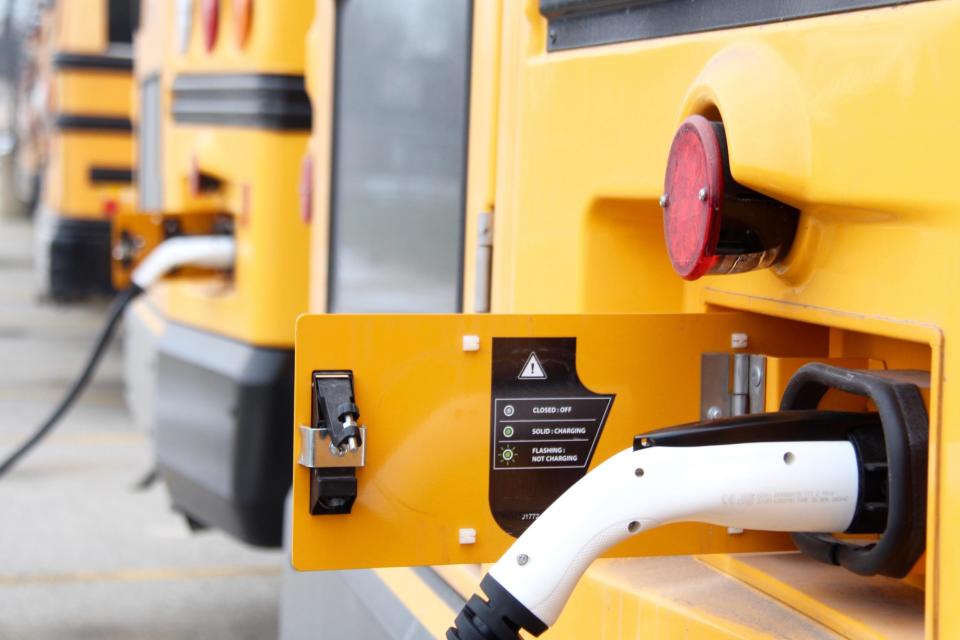 A pair of new electric buses for Zeeland Public Schools recharge after morning routes on Jan. 9, 2020.