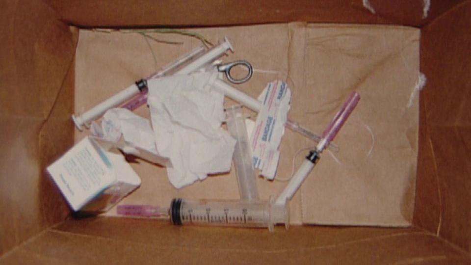 The contents of the Dorotik's bathroom garbage can. / Credit: San Diego County Sheriff's Department