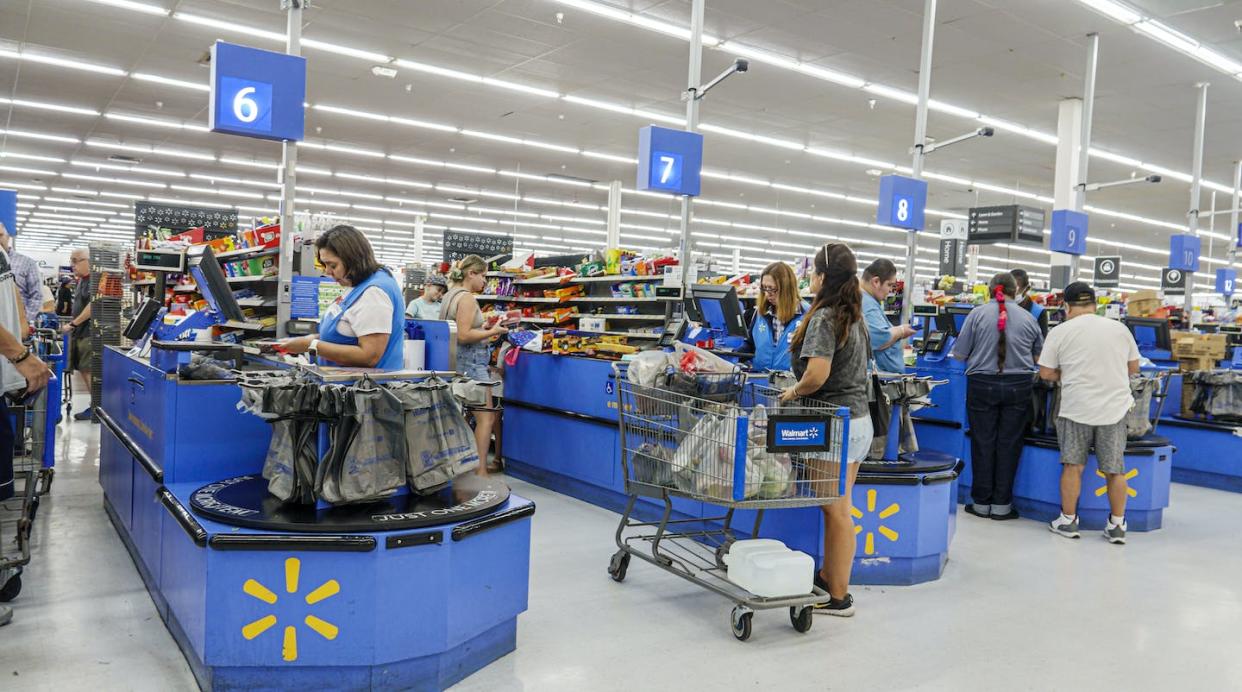 Walmart has embraced checkout charity. <a href="https://www.gettyimages.com/detail/news-photo/miami-florida-hallandale-beach-walmart-store-cashier-and-news-photo/1519961181?adppopup=true" rel="nofollow noopener" target="_blank" data-ylk="slk:Jeffrey Greenberg/Universal Images Group via Getty Images;elm:context_link;itc:0;sec:content-canvas" class="link ">Jeffrey Greenberg/Universal Images Group via Getty Images</a>