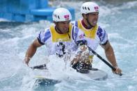 Britain's Tim Baillie (L) and Etienne Stott compete for gold in the Canoe Double Men's Slalom Semi-final at the "Lee Valley White Water Centre", in London, on day 6 of the London 2012 Olympic Games