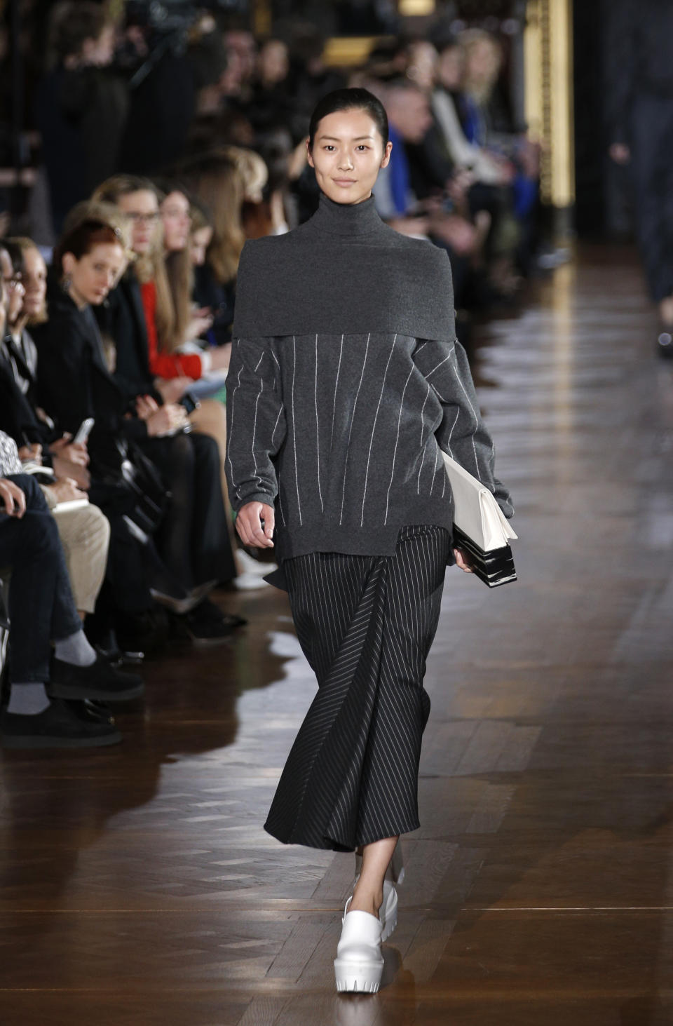 A model wears a creation by fashion designer Stella McCartney for her Fall/Winter 2013-2014 ready to wear collection, in Paris, Monday, March, 4, 2013. (AP Photo/Christophe Ena)