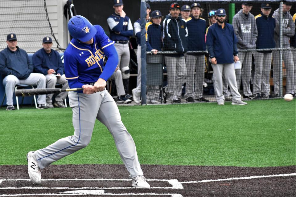 Francis Howell's Brett Norfleet winds up a swing on what became a two-run home run during the Vikings' 11-0 win over Battle on April 15, 2022, at Battle High School.
