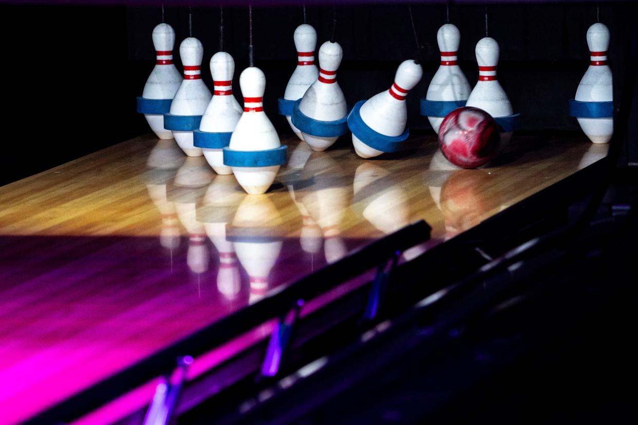 A bowling ball hits the duck-pins at Putts and Pins, 6920 EP True Pkwy, Suite 105, on Tuesday, November 21, 2023 in West Des Moines.