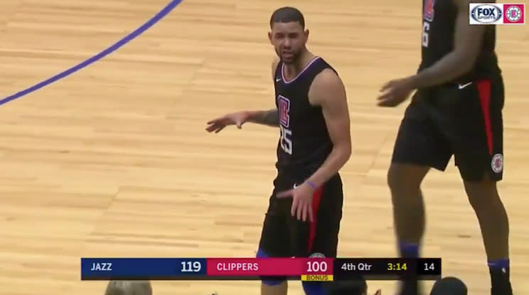 Austin Rivers tries talking sense into a “fairweather” Clippers fan.