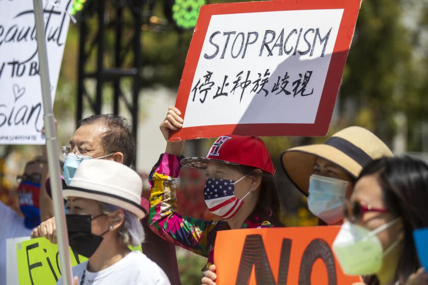 LOS ANGELES, CA - MAY 08: Linda Shen, middle, of Alhanbra is participating in a Youth Against Hate rally for a solidarity in light of anti-Asian violence and hate crimes on Saturday, May 8, 2021 in Los Angeles, CA. (Francine Orr / Los Angeles Times)